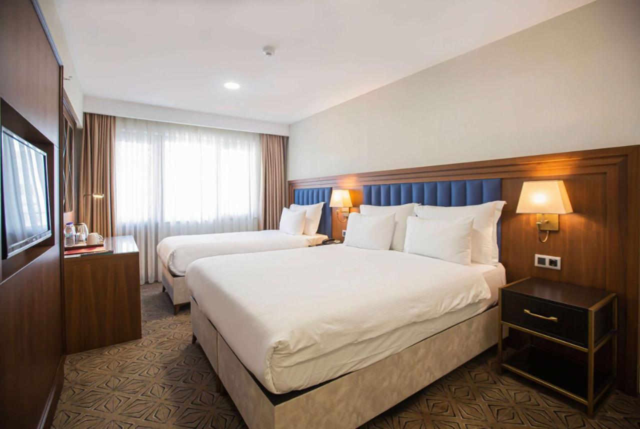 Ramada Plaza Sultanahmet Hotel Istambul Exterior foto A room at the hotel