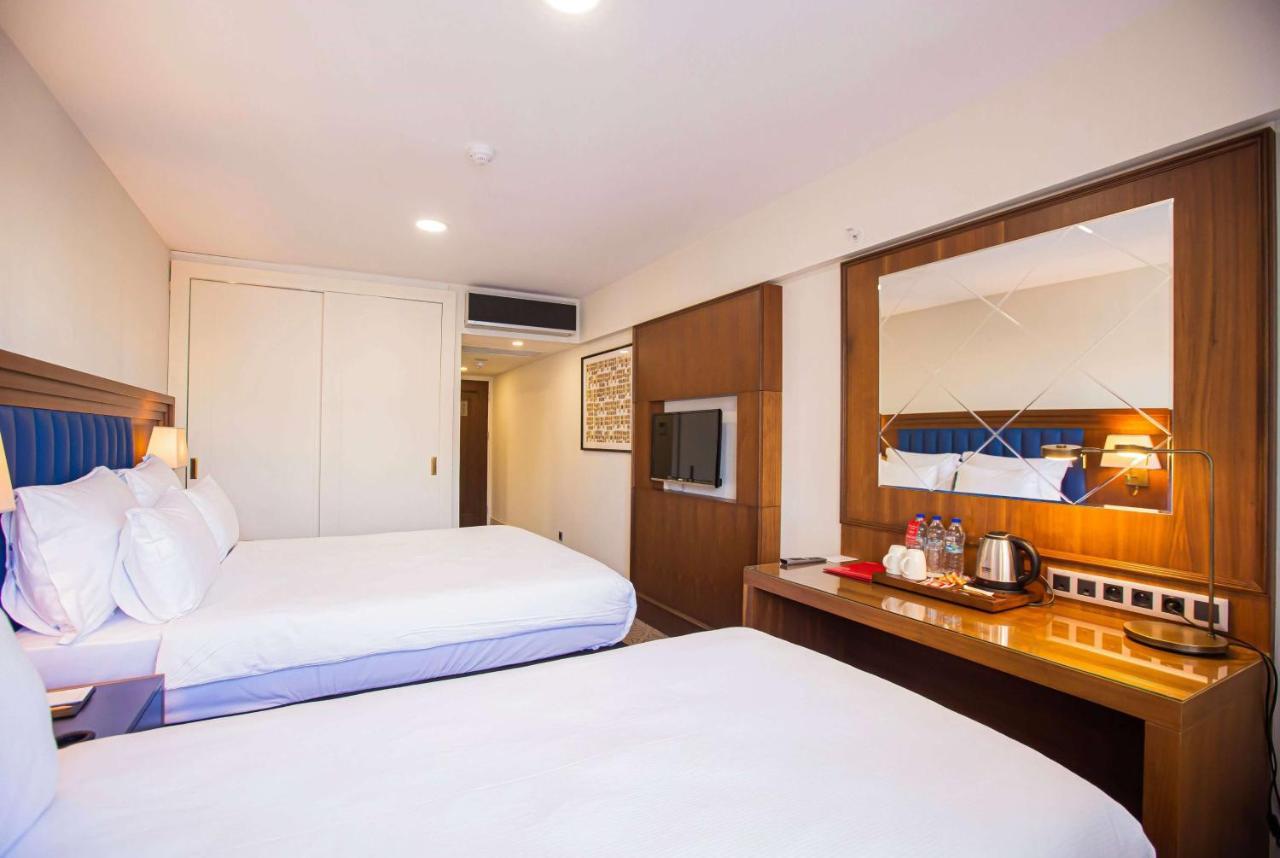 Ramada Plaza Sultanahmet Hotel Istambul Exterior foto A room at the hotel