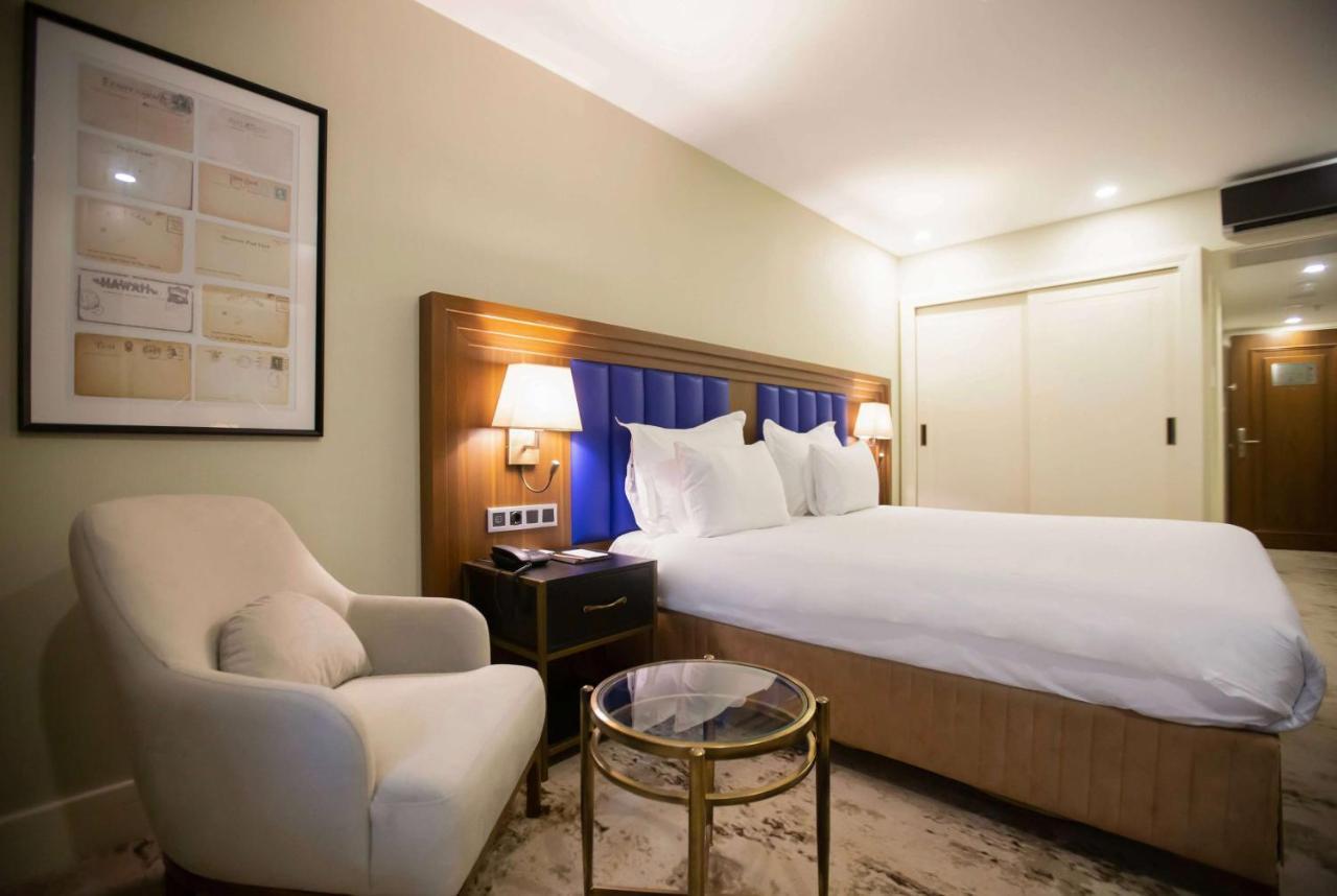 Ramada Plaza Sultanahmet Hotel Istambul Exterior foto A bedroom at the hotel