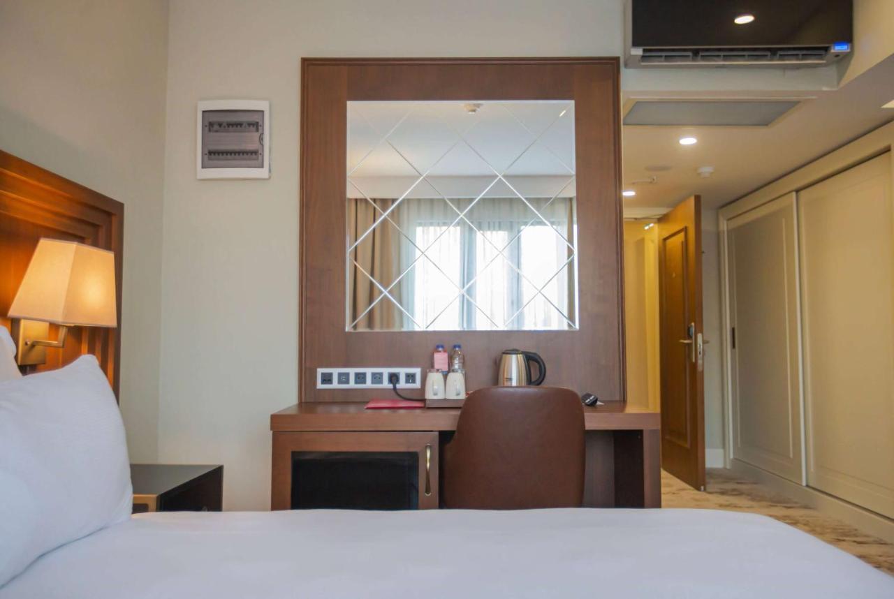 Ramada Plaza Sultanahmet Hotel Istambul Exterior foto A room at the hotel